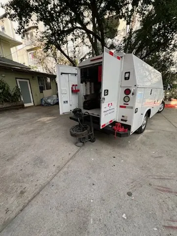 Magnet Plumbing service vehicle on-site for Grease Trap Cleaning in Brentwood Estates of Excel
